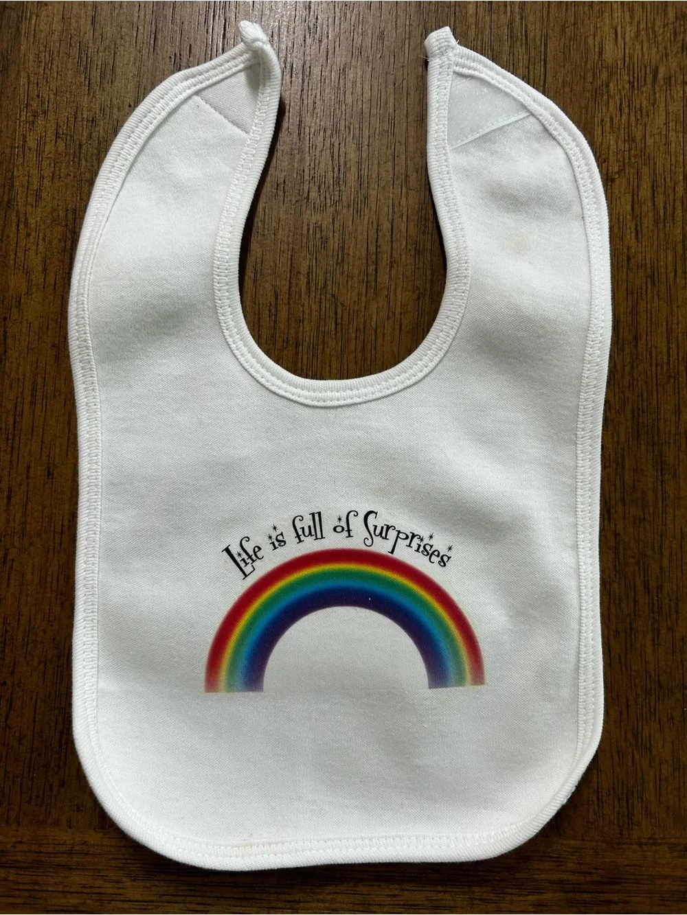 NEW White Baby Bib with Rainbow Graphic - 